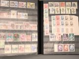 many different stamps on the pages of a book