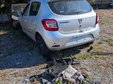 a silver car that is parked on the side of the road