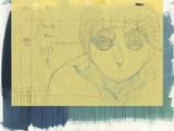 un morceau de papier jaune sur lequel est dessiné le visage d'un homme