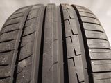 a close up view of a tire on a white background