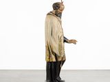 an image of a statue of a man with a cane