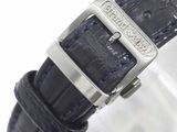 a close up of a wrist watch with a black strap