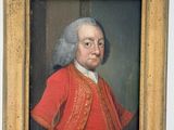 portrait d'un homme vêtu d'un manteau rouge et aux cheveux blancs