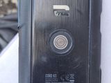 a cell phone that is sitting on top of a table