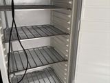 an open refrigerator with a lot of food inside of it