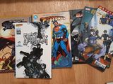 a lot of comic books on the table