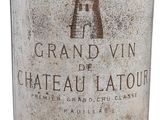 a bottle of wine that is sitting on a table