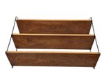 two wooden bookshelves hanging on a white wall