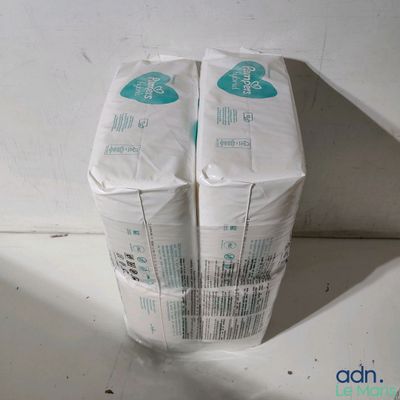 two rolls of toilet paper stacked on top of each other