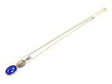 un collier en or orné d'un pendentif en verre bleu