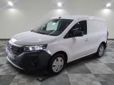the white van is parked on a checkered floor in a room