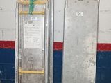 a ladder leaning up against a wall in a room