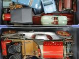 a blue box filled with different types of toy cars
