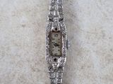an image of a ladies ' s watch with diamonds on it