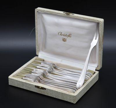 a box with a set of forks and spoons in it
