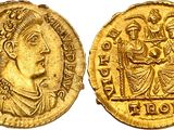 a gold coin with an image of a man and a woman on it