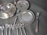 a table with silverware and silverware on it
