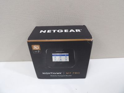 the box of the netgear nighthawk is open and ready to be used