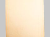 an old piece of paper on a gray background