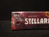 a box of cigarettes sitting on a black surface