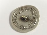 an image of a silver coin with the word ' i love you ' written on it