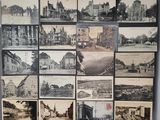 many pictures of old buildings on display on the wall