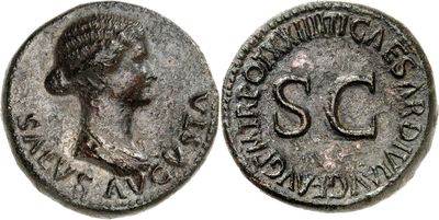 a close up of a coin with a woman ' s face on it