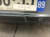 a close up of a car with a sticker on it ' s bumper