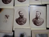 several old black and white photos of men with beards and mustaches