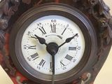 a clock that is sitting on top of a table