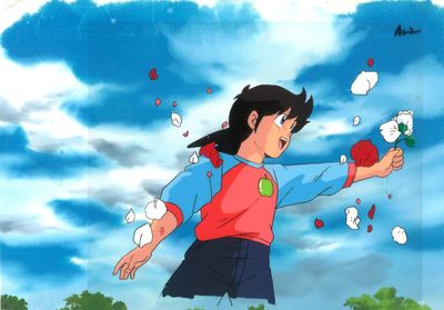une image représentant une fillette vêtue d'un t-shirt rouge et d'une jupe bleue, tenant une pomme rouge