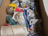 a box full of items that are sitting on the floor