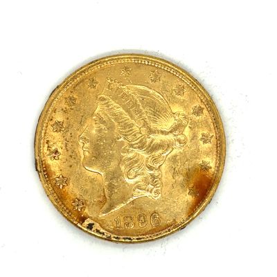 une image d'une pièce d'or sur une surface blanche