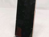 an image of a close up of a cell phone on a stand