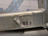 a close up of a piece of metal with a barcode on it