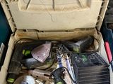 a tool box with tools in it sitting on the floor