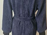 an image of a robe on a mannequin stand