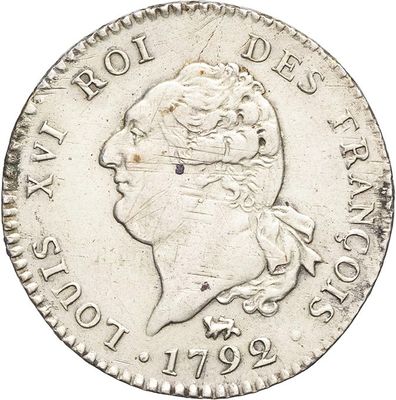 a close up of a coin on a white background