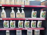 many bottles of cleaning products on the shelves in the store