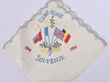 a white handkerchief with a design of flags on it