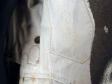 a close up of a piece of clothing with a tag on it