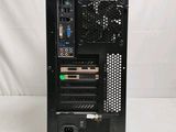 a black computer tower sitting on a white surface