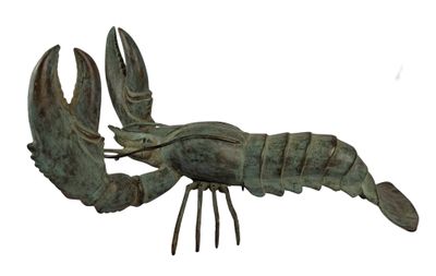 statue of a lobster on a stand on a white background