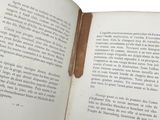 an open book with a picture of a bird on it