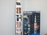 a model of a rocket sitting on a table