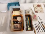 a plastic container filled with various items on a table