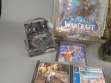 many video games on the table and a clock on the table