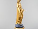 an image of a statue of a woman holding a child