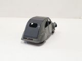 a toy car that is sitting on a white surface