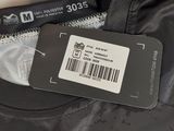 the back of a hockey jersey with a tag on it